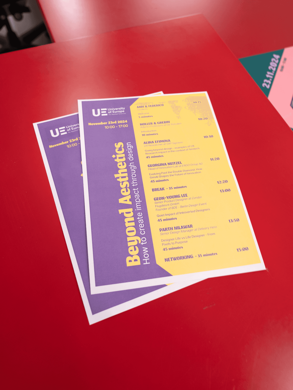 Timetable handouts on a red chair